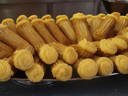 churros with yellow frosting